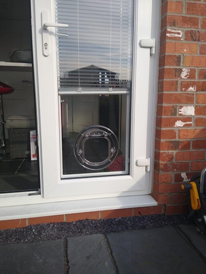 Toughened glass panel cat flap installation in a patio door — fitted by That Cat Flap Company