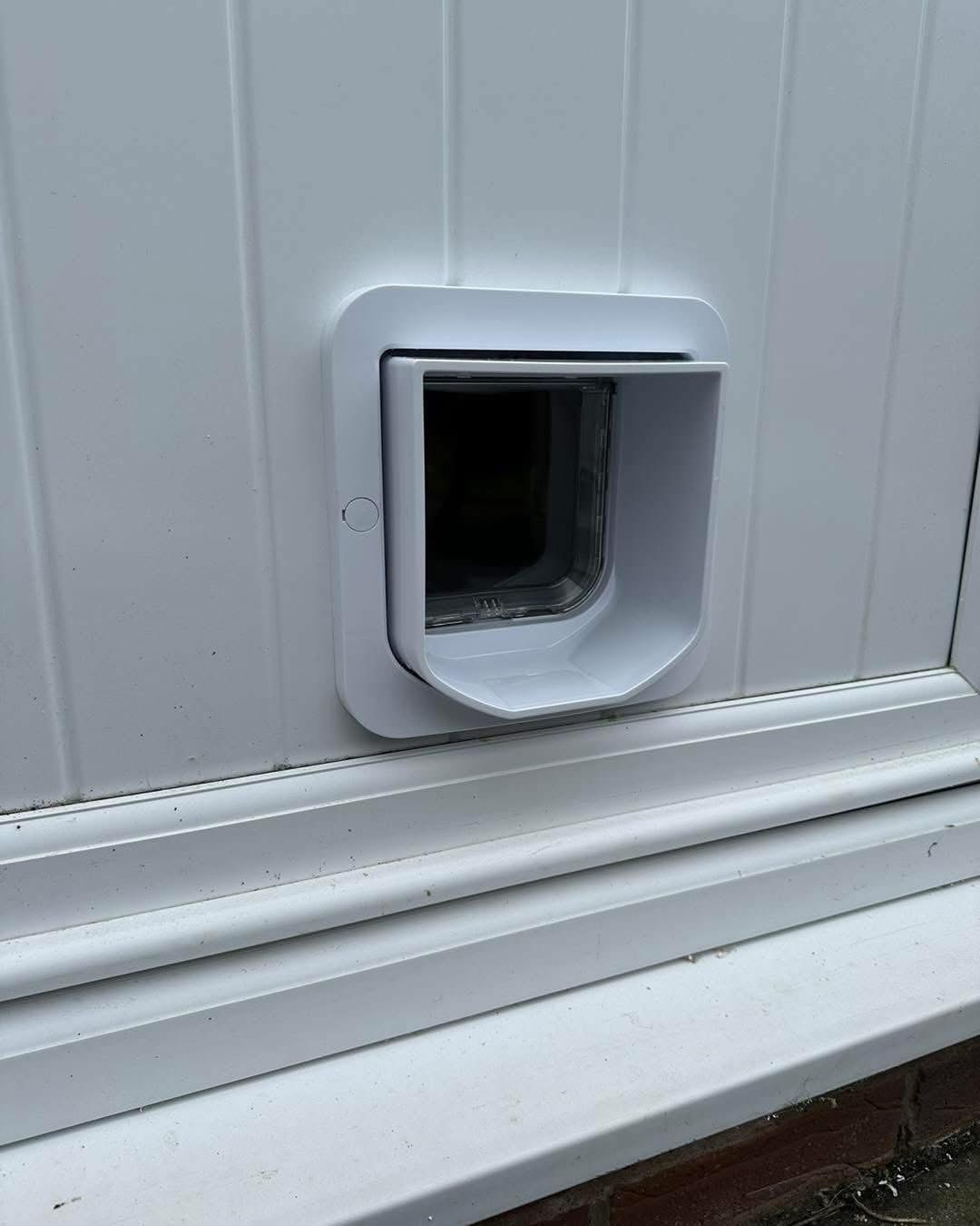 Cat flap in UPvc door installation Halifax